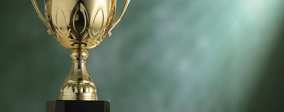 Trophy on green background