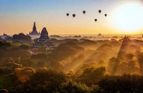 Balloons above landscape