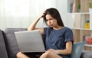 Confused teen reading