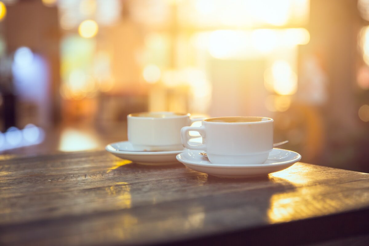 coffee on table with sunset