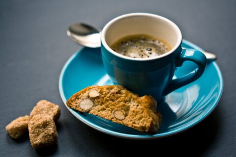 Close up of coffee with biscuit