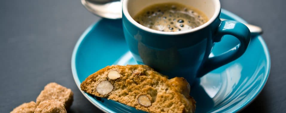 Close up of coffee with biscuit