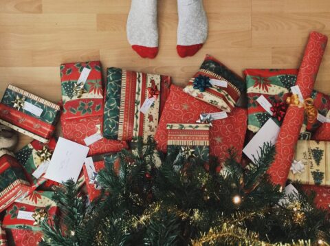 feet by presents christmas tree