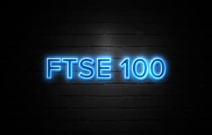 Ftse 100 neon Sign on brickwall