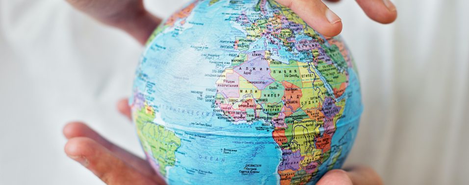 a globe being actively held