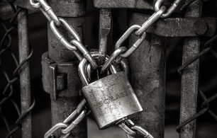 A padlock and chains protecting something valuable