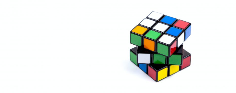 a multi-coloured rubiks cube puzzle representing multi-assets as part of a whole