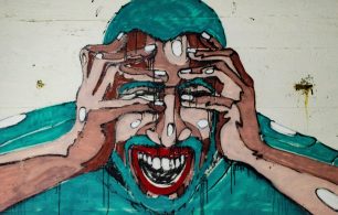 mosaic of a face in pain