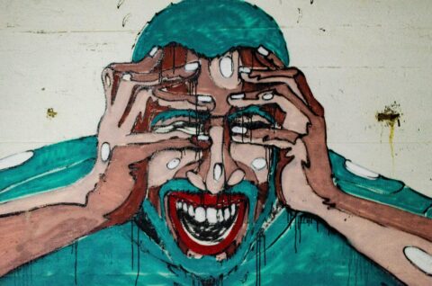mosaic of a face in pain