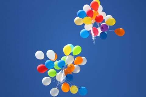balloons high in the sky up high