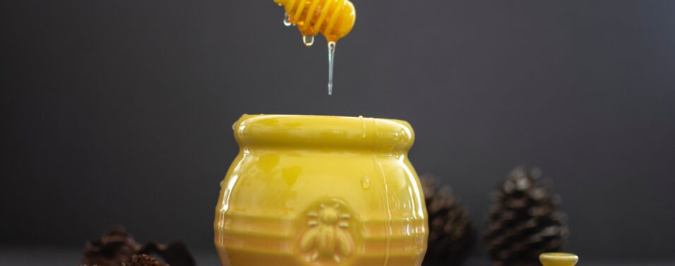 honey pot representing money