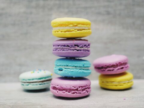 coloured macarons layered in a tower