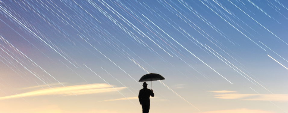 reducing risk of getting wet by using an umbrella