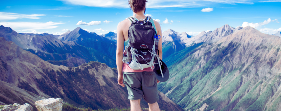 A man navigating through mountains
