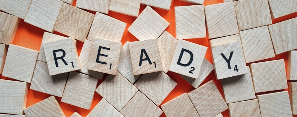 letter tiles spelling out READY for the unexpected