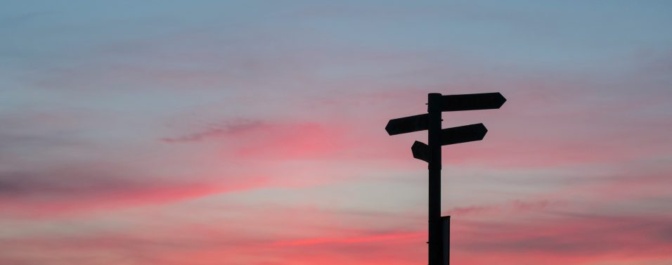 crossroads sign in the sunset